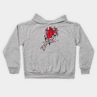 Skeleton hand holding anatomical red heart Kids Hoodie